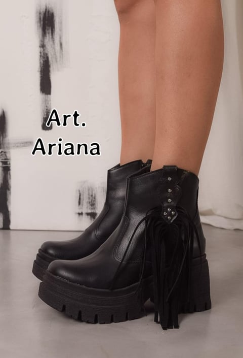 Black platform ankle boots with fringe detail